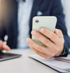 person contacting lawyer on phone